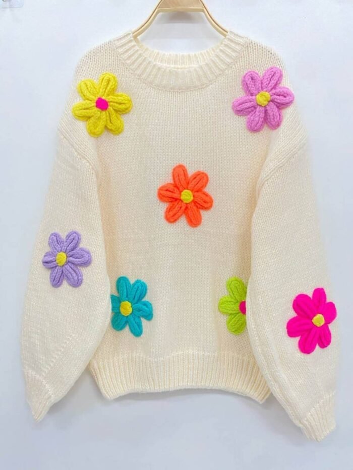 pull blanc à fleurs de marguerites multicolores